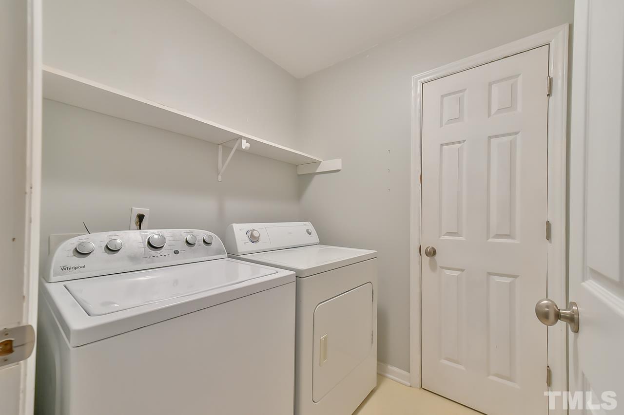 7204 Ray Road Raleigh, NC 27613 - Photo 34 of 40 a utility room with dryer and washer
