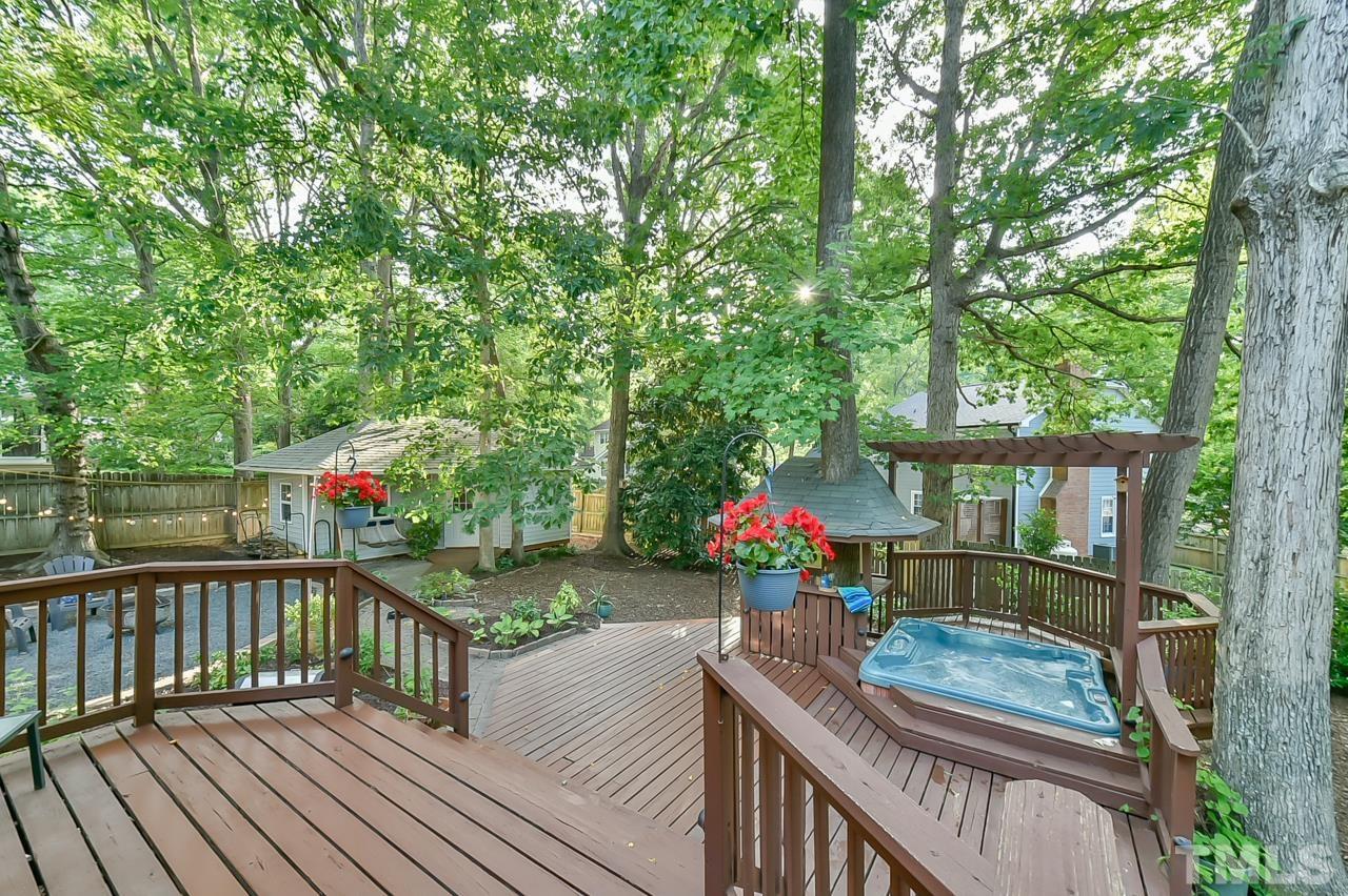 7204 Ray Road Raleigh, NC 27613 - Photo 5 of 40 a view of deck with furniture and trees around