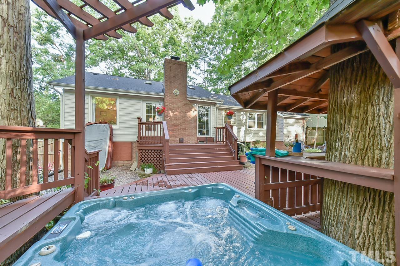 7204 Ray Road Raleigh, NC 27613 - Photo 8 of 40 a view of a chair and table in the balcony