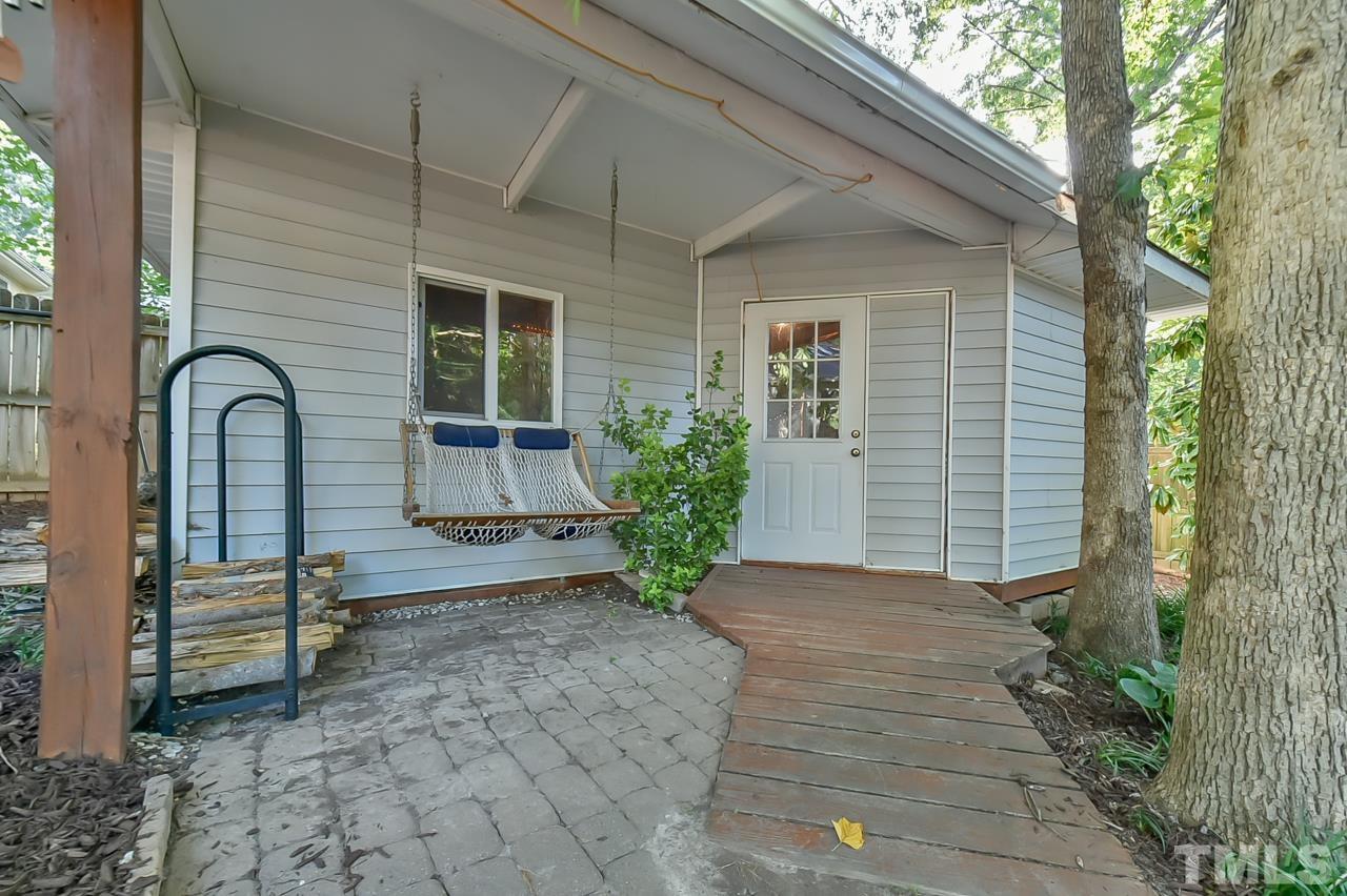 7204 Ray Road Raleigh, NC 27613 - Photo 10 of 40 a house view with a outdoor space