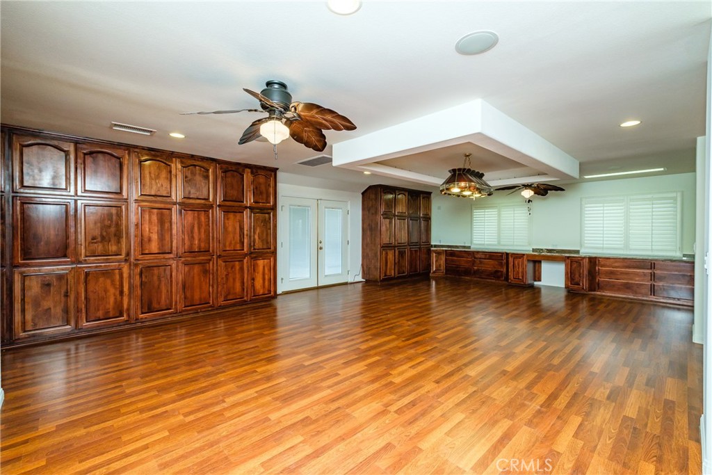 19670 Tonkawan Road Apple Valley, CA 92307 - Photo 11 of 29 a view of a livingroom with wooden floor