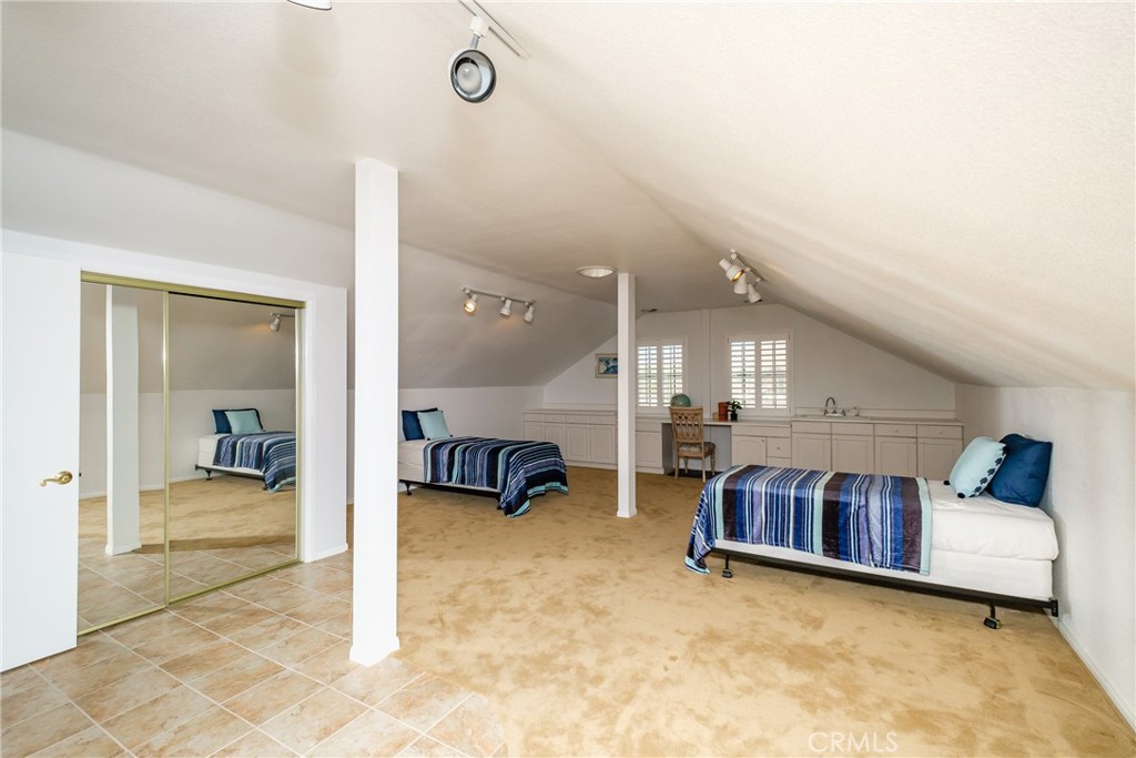 19670 Tonkawan Road Apple Valley, CA 92307 - Photo 13 of 29 a living room with furniture and a large window