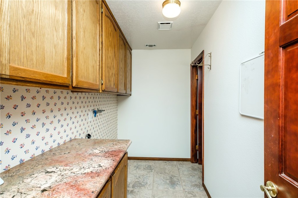 19670 Tonkawan Road Apple Valley, CA 92307 - Photo 10 of 29 a view of kitchen with wooden floor