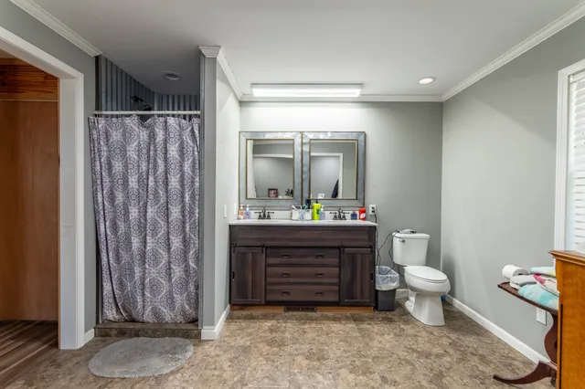 a view of a backyard with a sitting area and slide