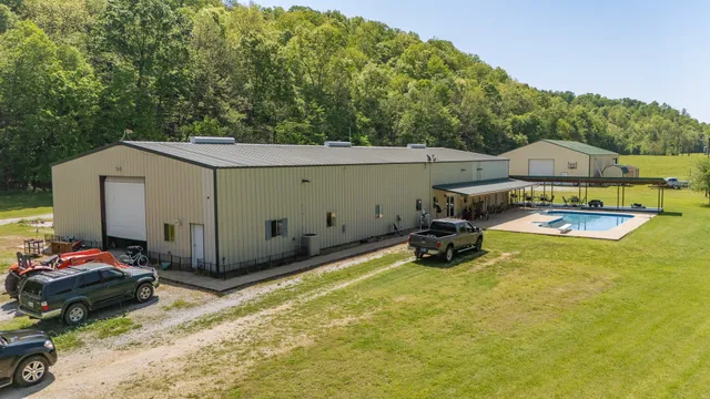 a bathroom with a sink mirror and toilet