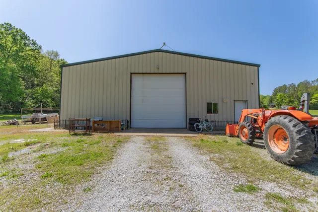a view of parking garage with cars