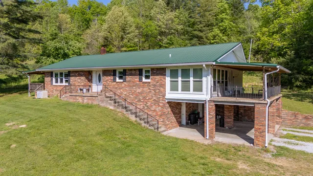 a kitchen with refrigerator and cabinets