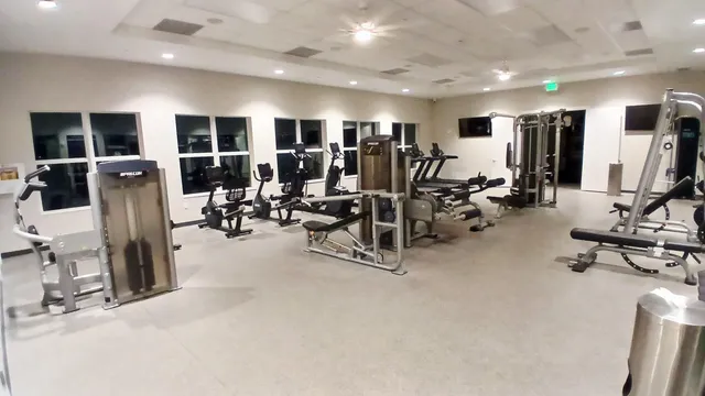 a view of a room with gym equipment