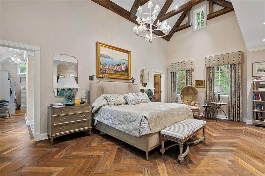 1909 Highgate Road Pittsburgh, PA 15241 - Photo 22 of 47 a bedroom with a bed and a chandelier