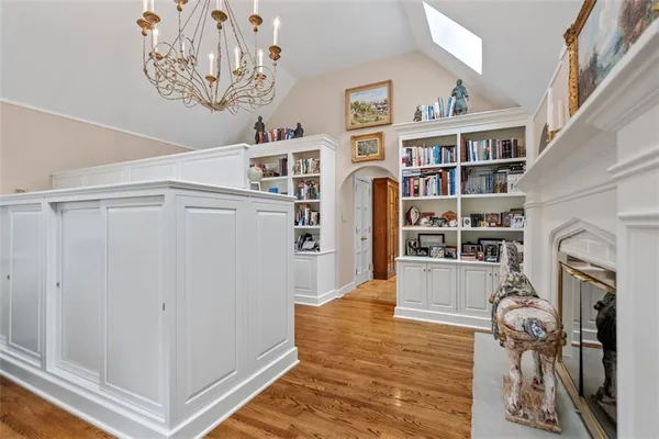 a large bathroom with a double vanity sink and a mirror
