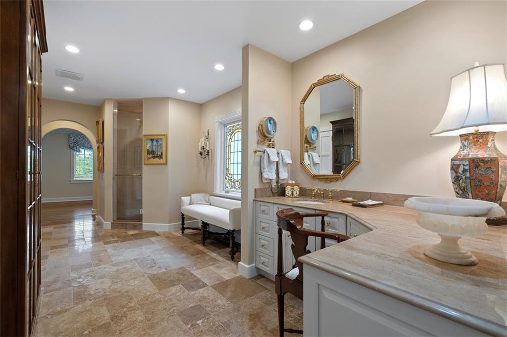 1909 Highgate Road Pittsburgh, PA 15241 - Photo 37 of 47 a large bathroom with a double vanity sink and a mirror