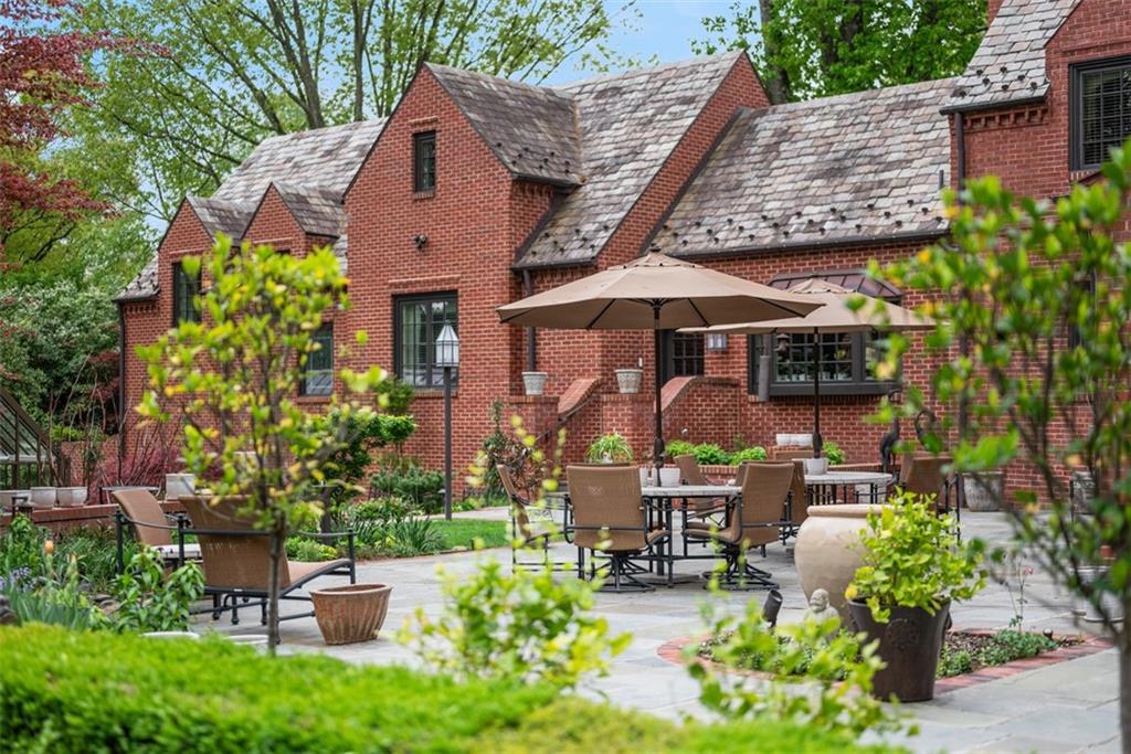 1909 Highgate Road Pittsburgh, PA 15241 - Photo 44 of 47 an aerial view of a house with table and chairs under an umbrella