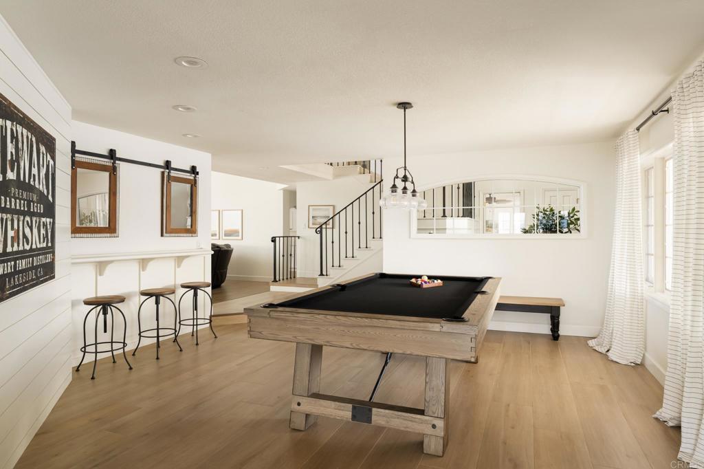 12212 Rockstream Road Lakeside, CA 92040 - Photo 14 of 36 a living room with furniture and a wooden floor