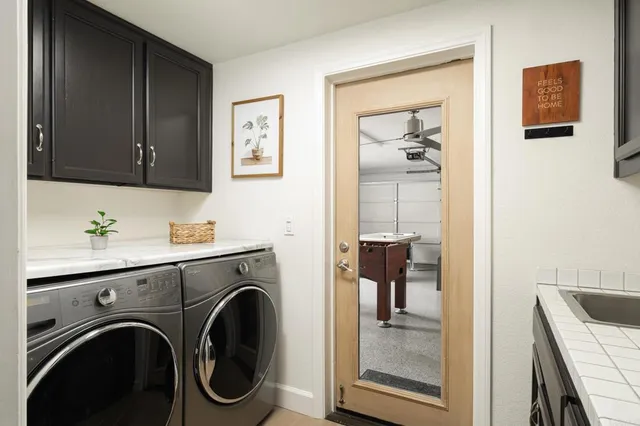 a view of hallway with washer and dryer