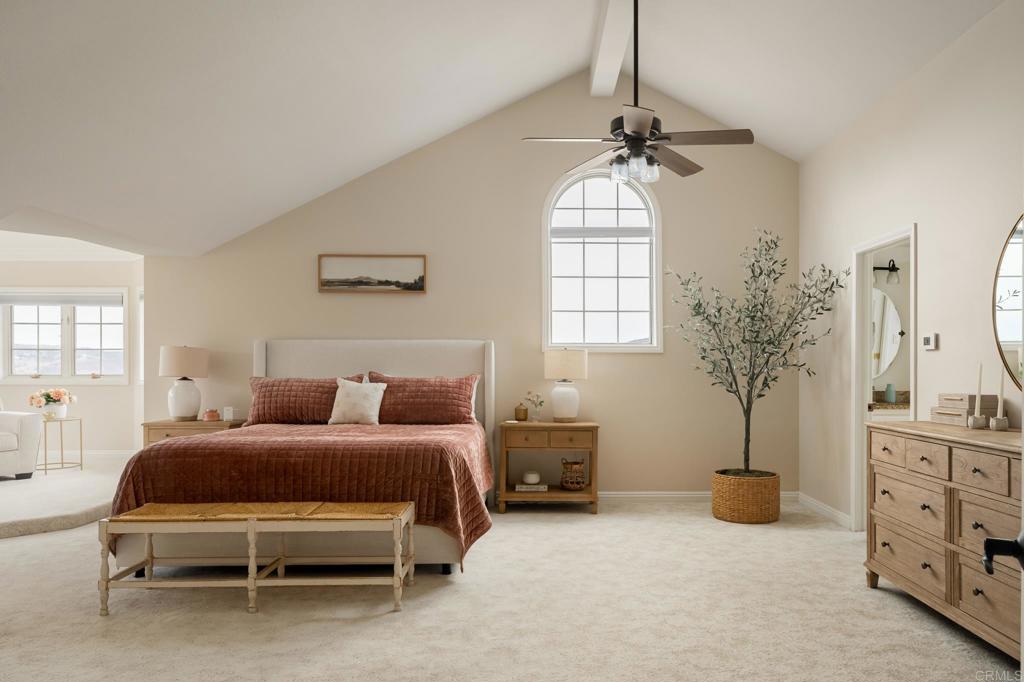 12212 Rockstream Road Lakeside, CA 92040 - Photo 19 of 36 a bedroom with furniture and a chandelier