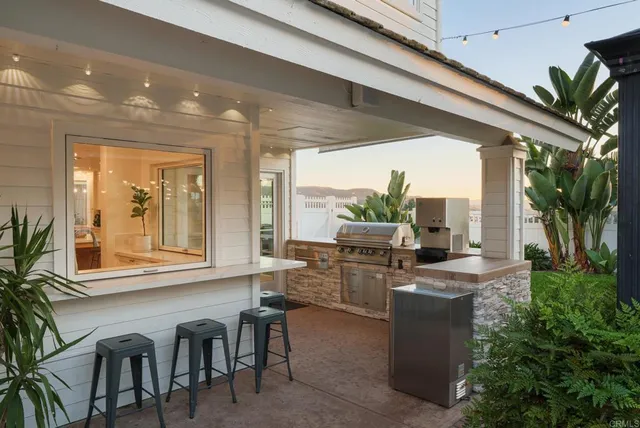 a kitchen with table and chairs