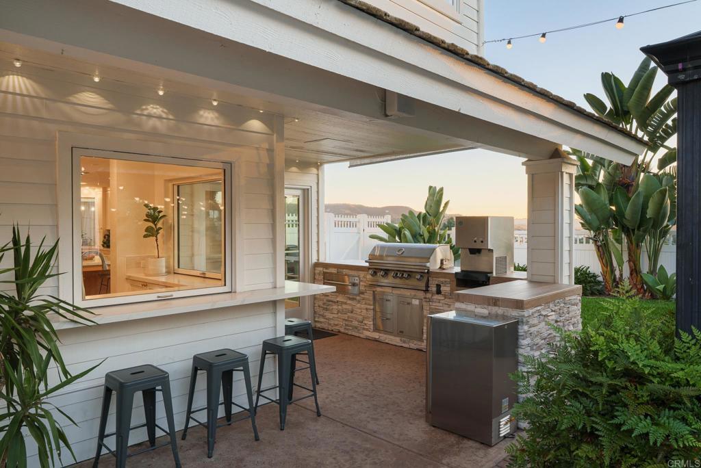 12212 Rockstream Road Lakeside, CA 92040 - Photo 26 of 36 a kitchen with table and chairs