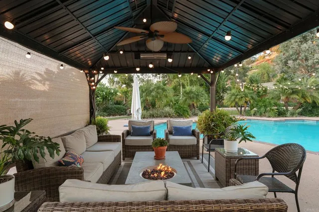 a outdoor living space with furniture and a garden