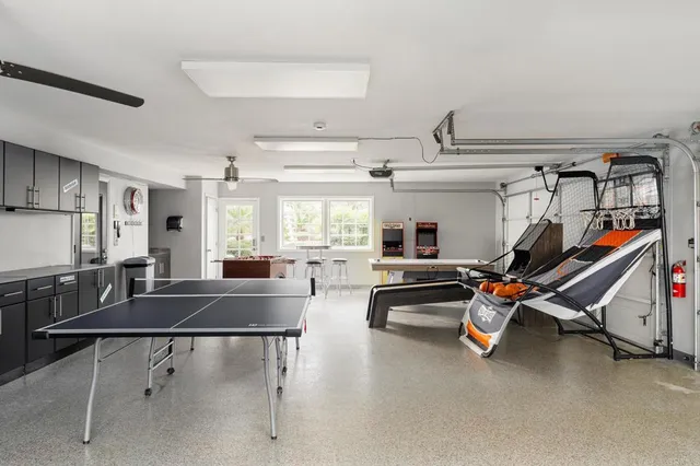 a room with gym equipment and windows