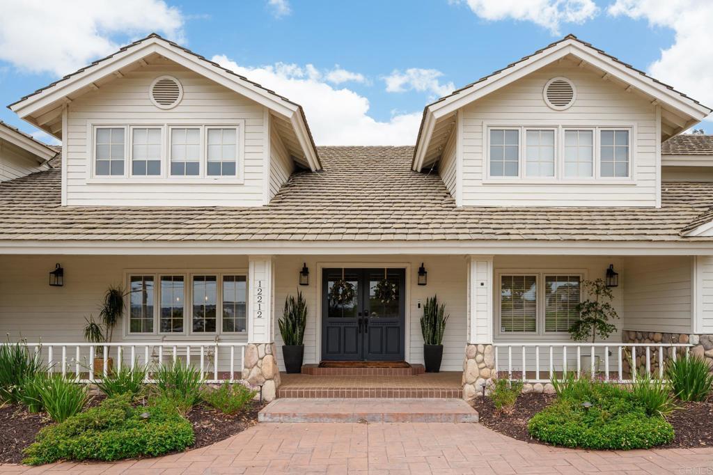 12212 Rockstream Road Lakeside, CA 92040 - Photo 4 of 36 a front view of house with a garden