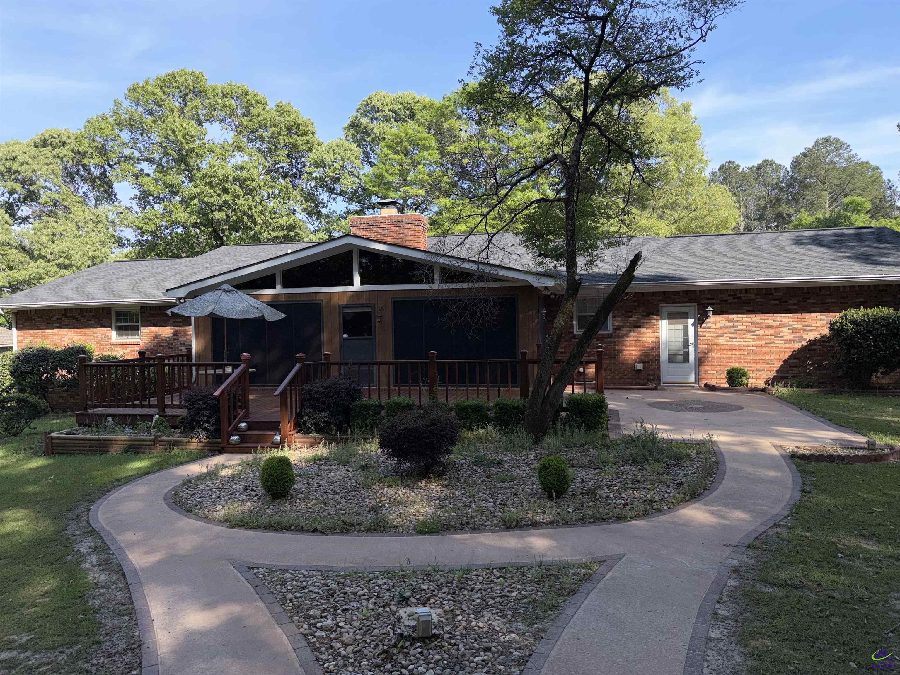 249 Hatcher Road Warner Robins, GA 31088 - Photo 5 of 25 a front view of a house with garden