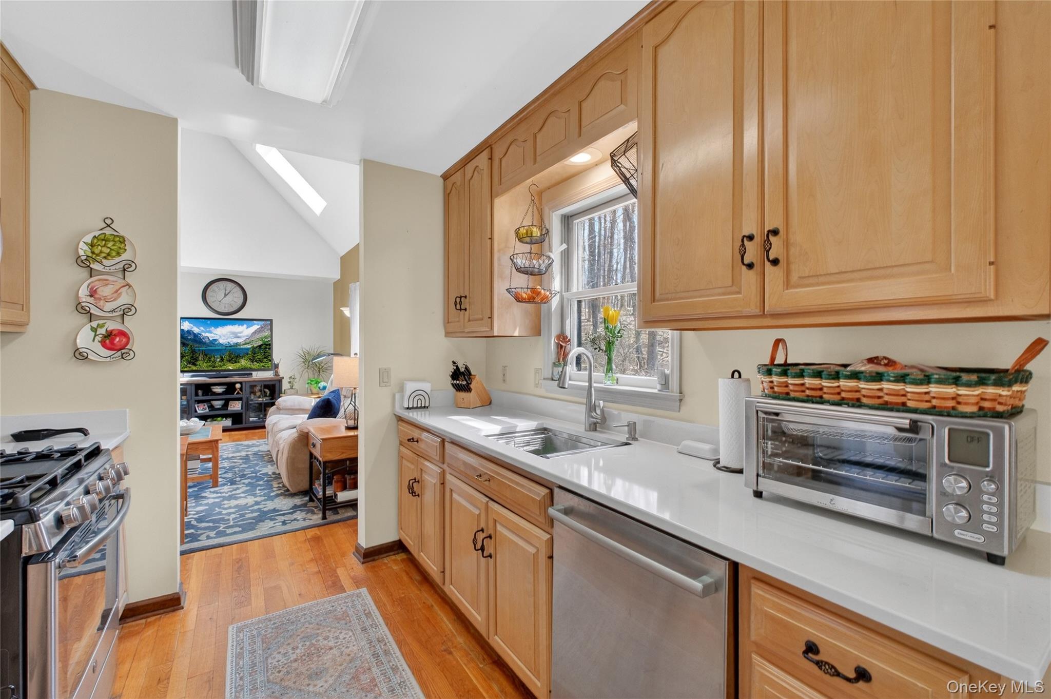 256 Overlook Road Poughkeepsie, NY 12603 - Photo 15 of 47 a kitchen with stainless steel appliances granite countertop a stove and a sink