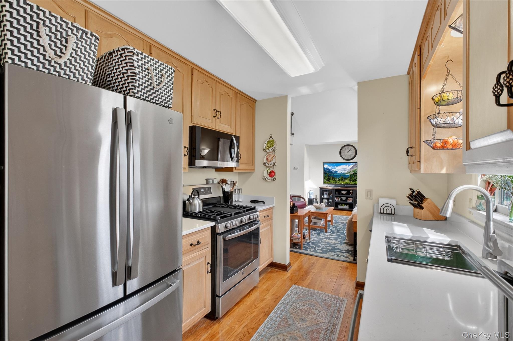 256 Overlook Road Poughkeepsie, NY 12603 - Photo 16 of 47 a kitchen with stainless steel appliances granite countertop a refrigerator a stove and a sink