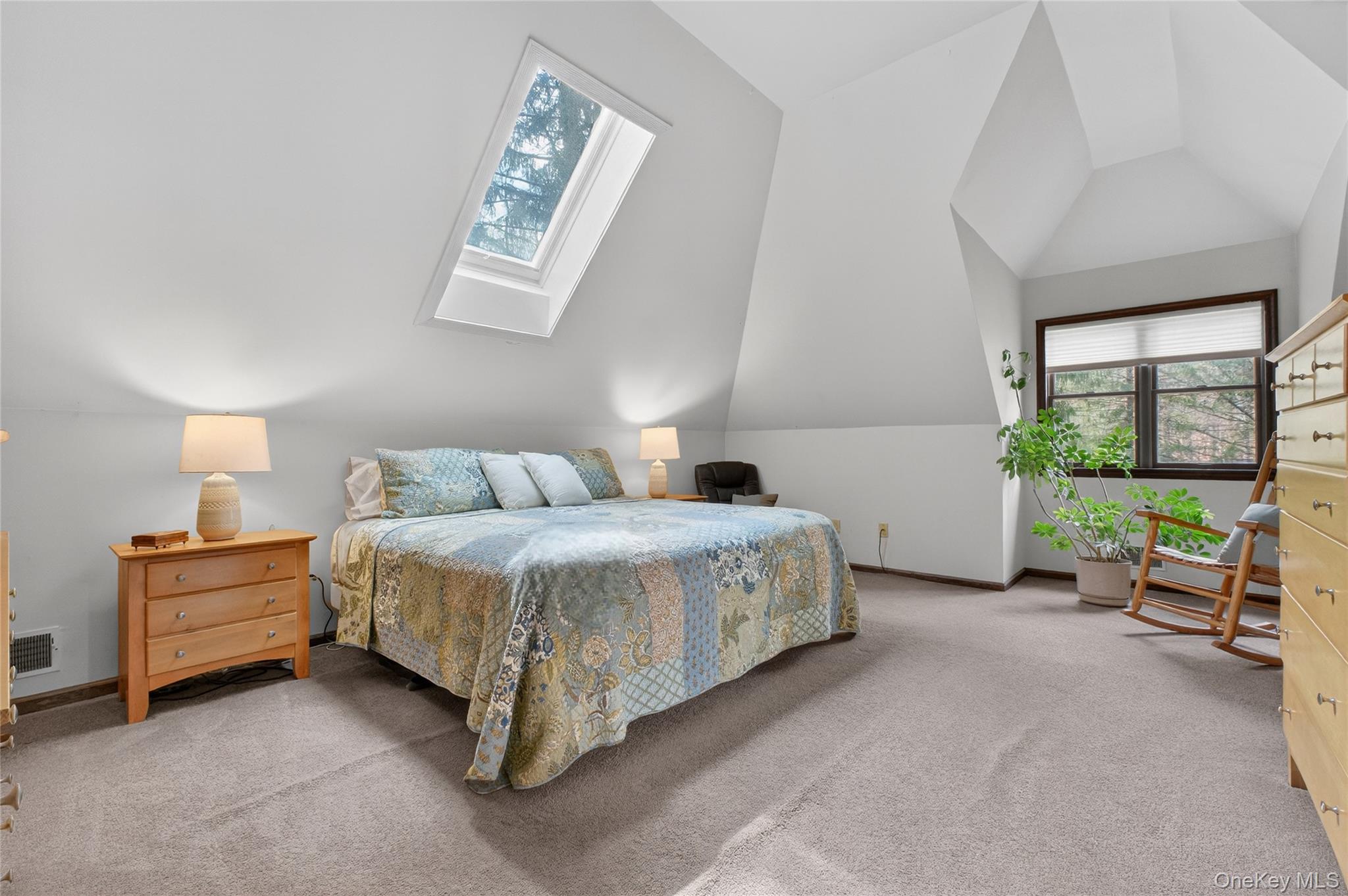 256 Overlook Road Poughkeepsie, NY 12603 - Photo 32 of 47 a spacious bedroom with a bed and a window