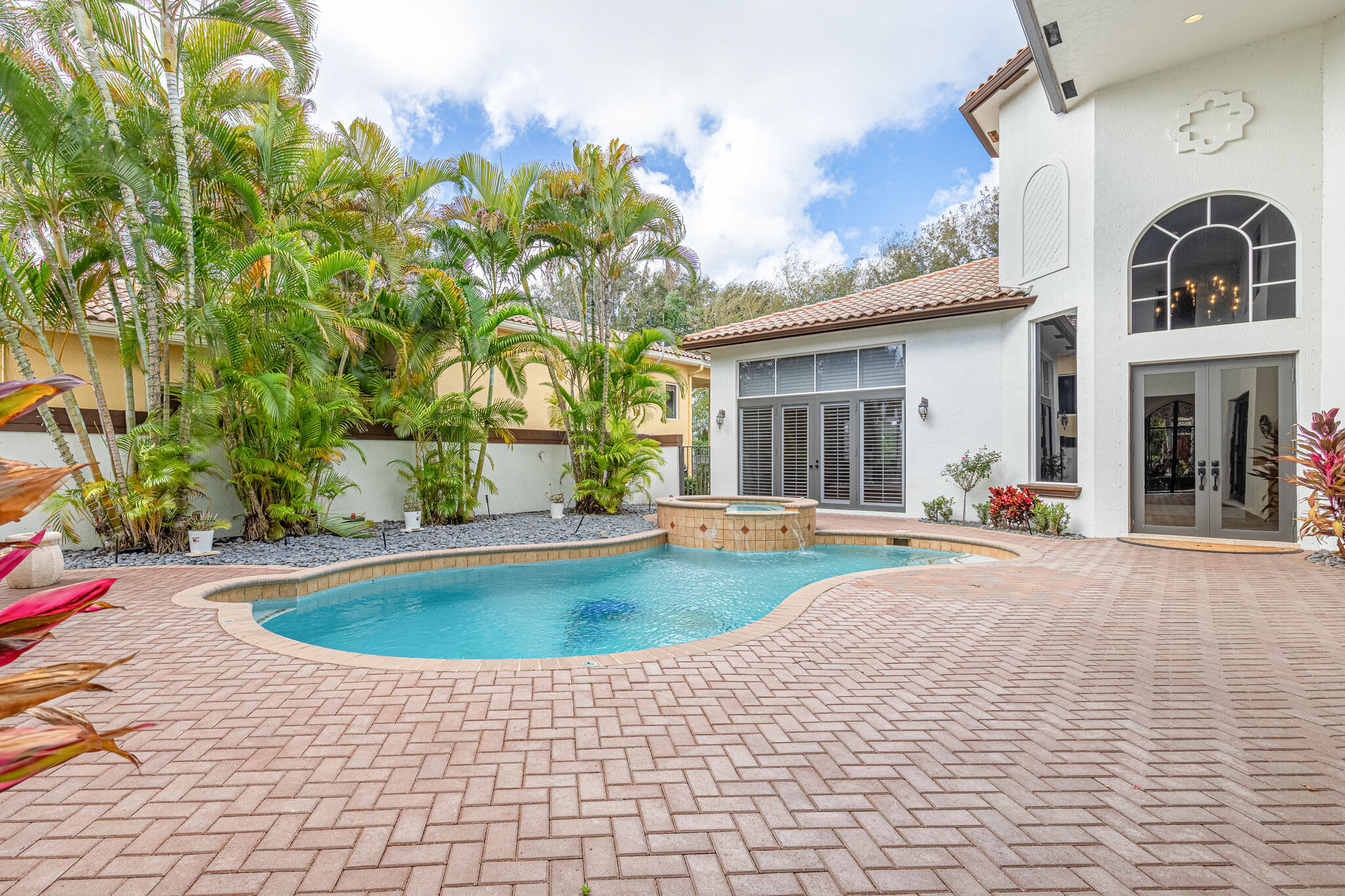 17550 Circle Pond Court Boca Raton, FL 33496 - Photo 13 of 99 a view of outdoor space yard swimming pool and patio