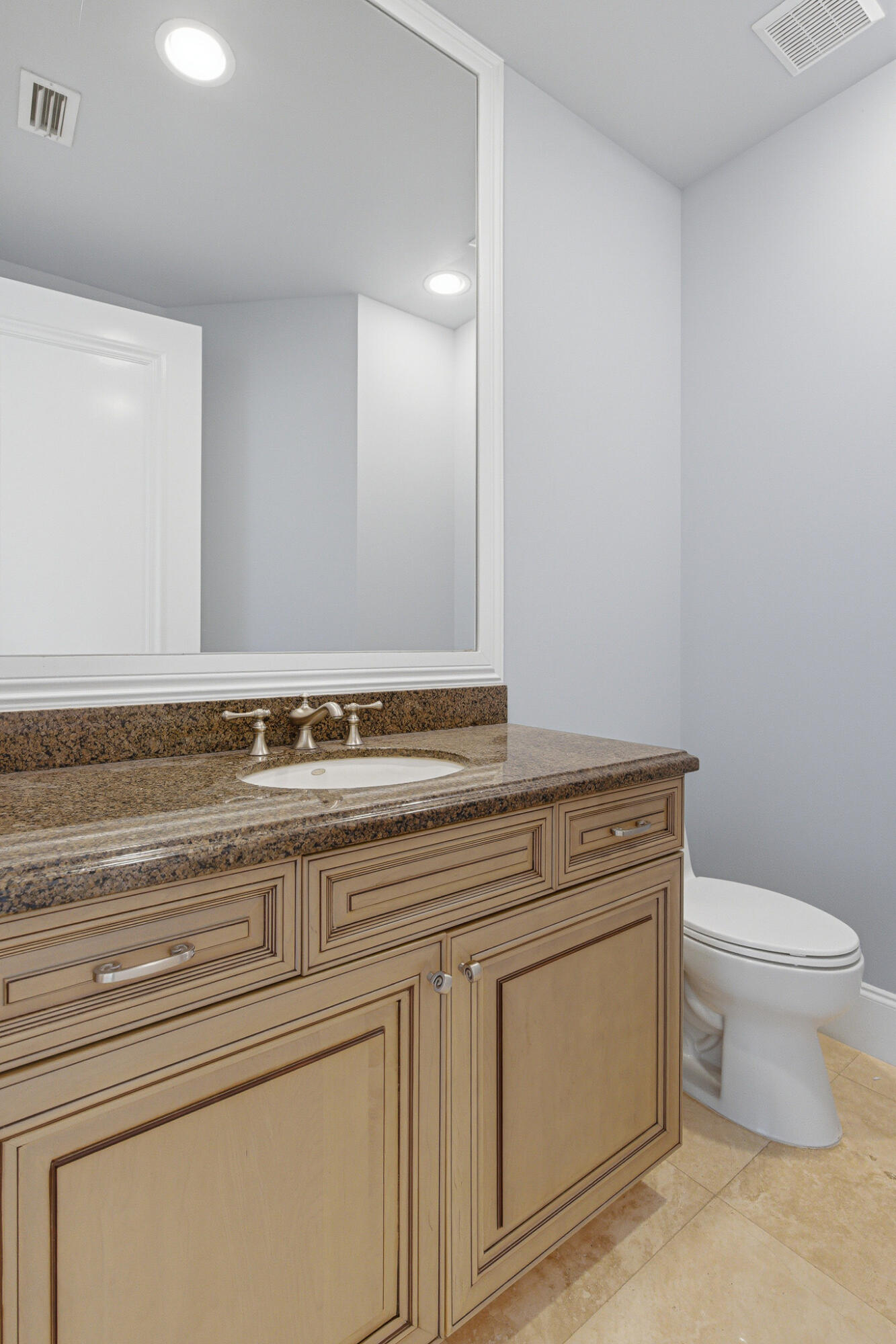 17550 Circle Pond Court Boca Raton, FL 33496 - Photo 26 of 99 a view of a bathroom with toilet and a sink