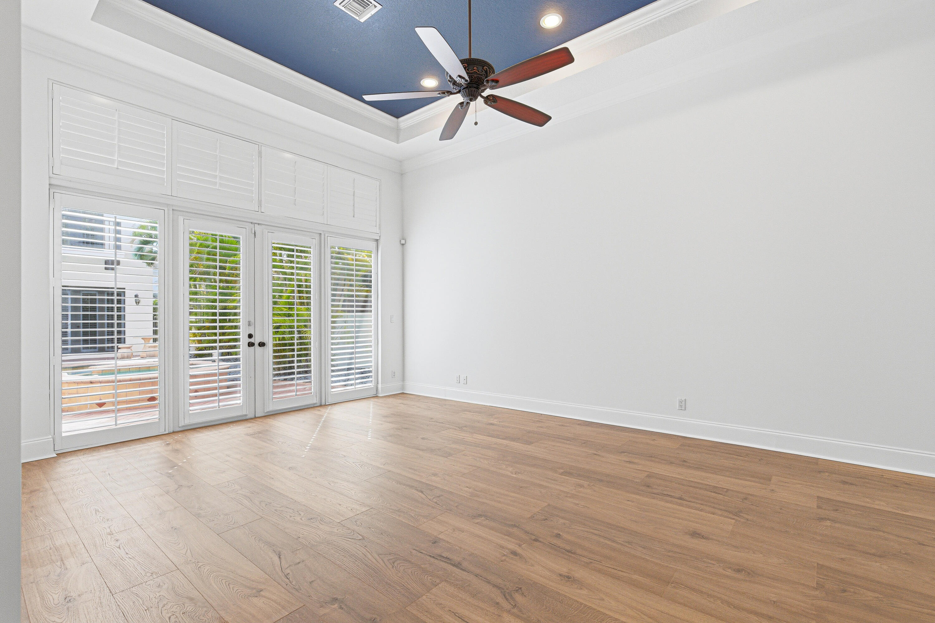 17550 Circle Pond Court Boca Raton, FL 33496 - Photo 33 of 99 wooden floor in an empty room with a window