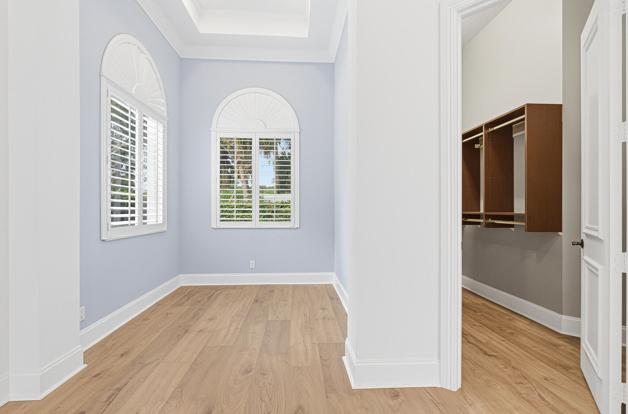 17550 Circle Pond Court Boca Raton, FL 33496 - Photo 37 of 99 an empty room with wooden floor closet and windows
