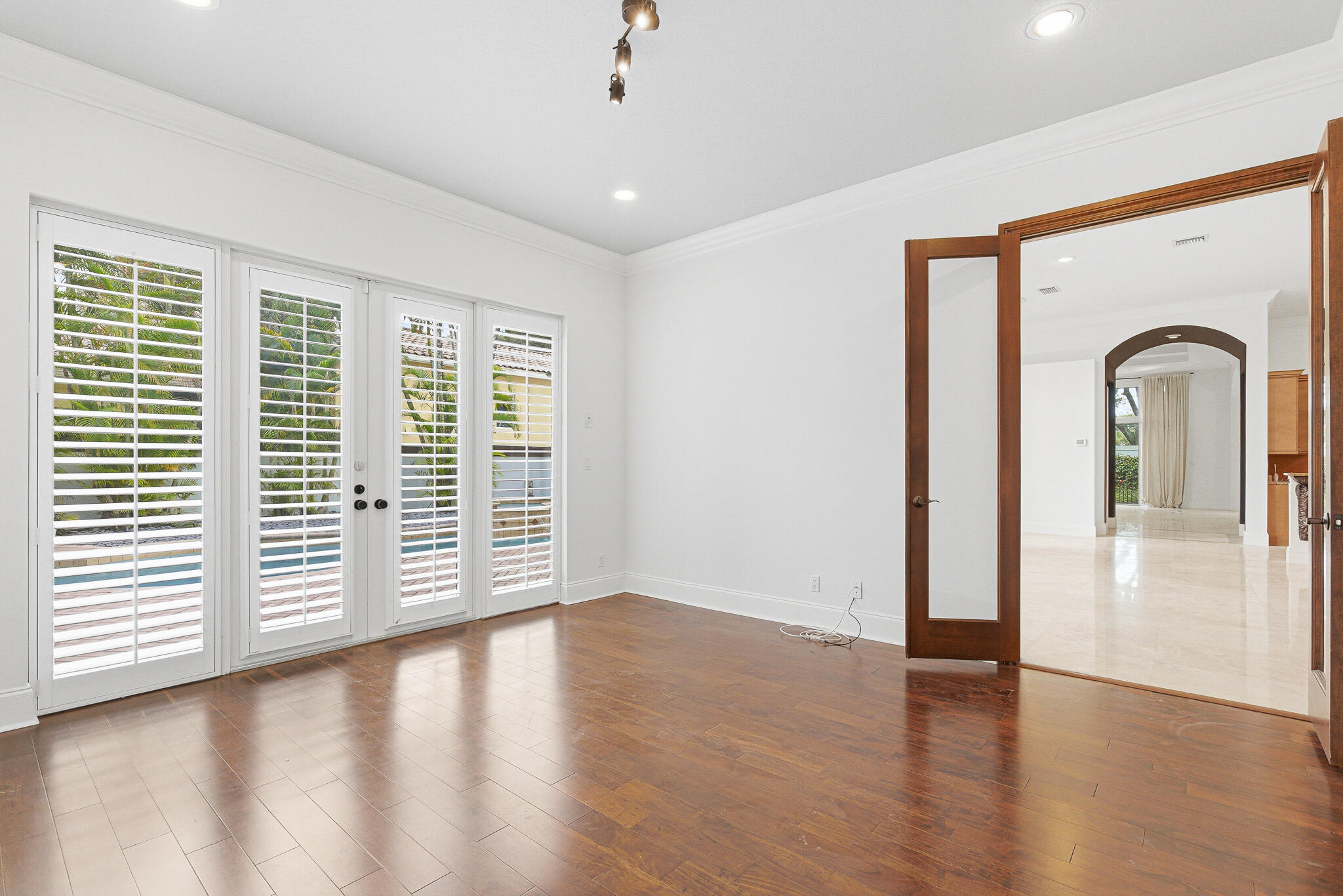 17550 Circle Pond Court Boca Raton, FL 33496 - Photo 42 of 99 a view of a kitchen with a large window with wooden floor