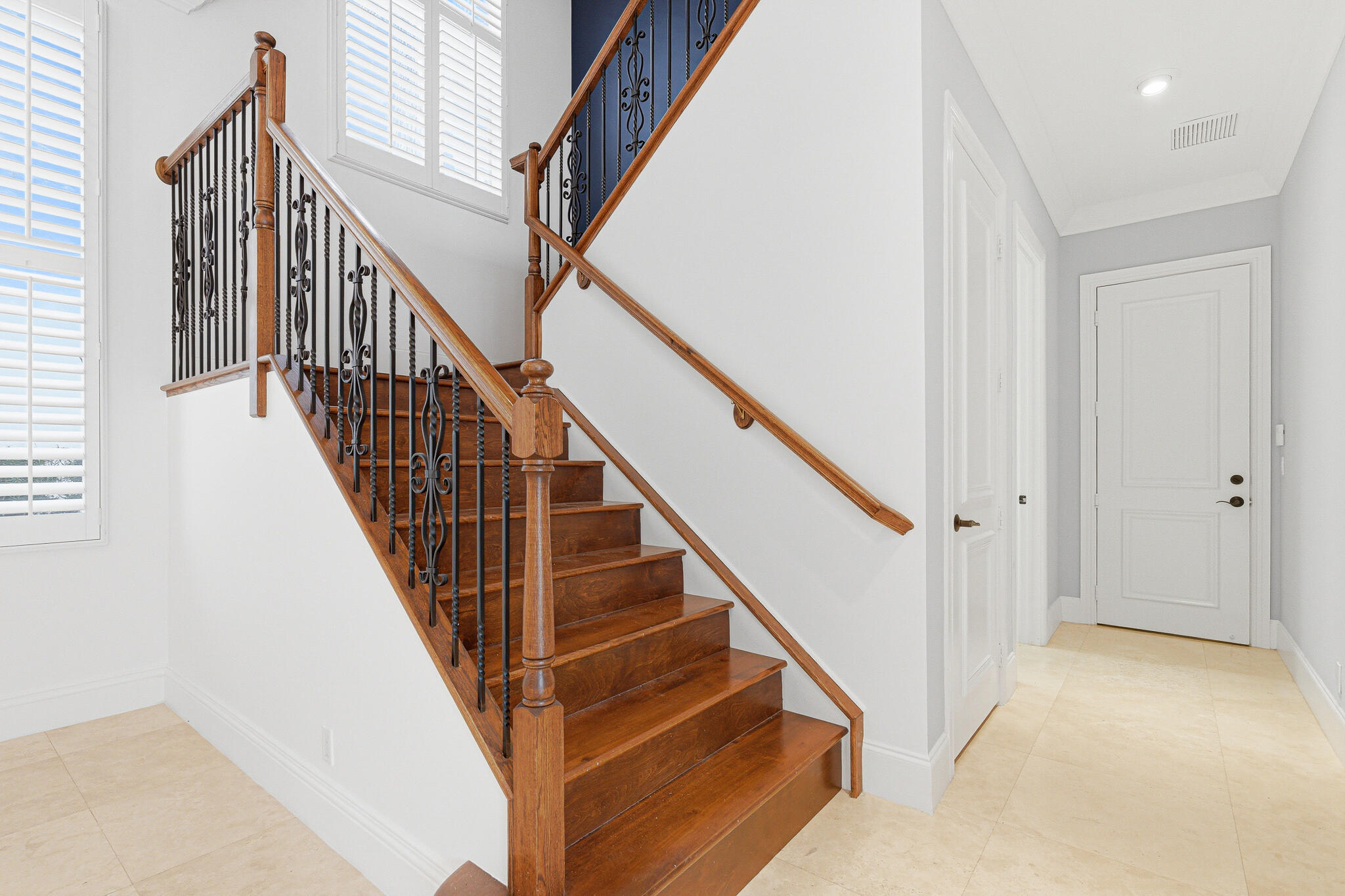 17550 Circle Pond Court Boca Raton, FL 33496 - Photo 45 of 99 a view of staircase with wooden floor and white walls