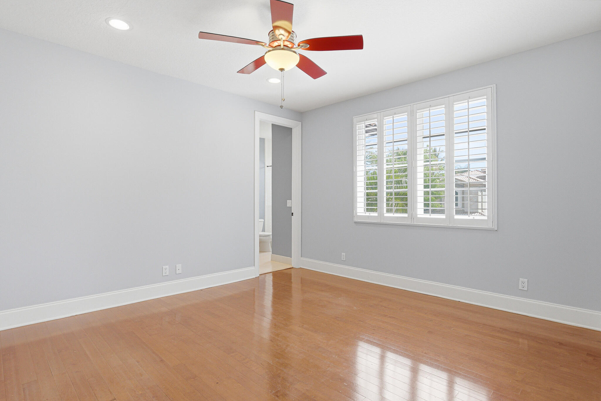 17550 Circle Pond Court Boca Raton, FL 33496 - Photo 62 of 99 an empty room with a window and a fan