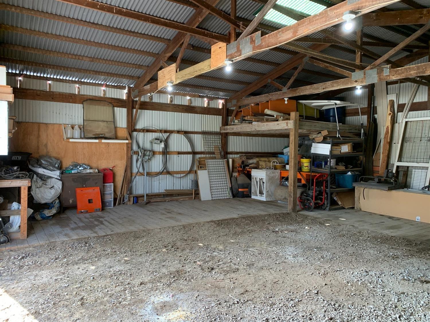 8305 Bocock Road Dillsboro, IN 47018 - Photo 64 of 80 Pole barn with workshop area or install animal stalls. Raised supply or loft area at the back corner.