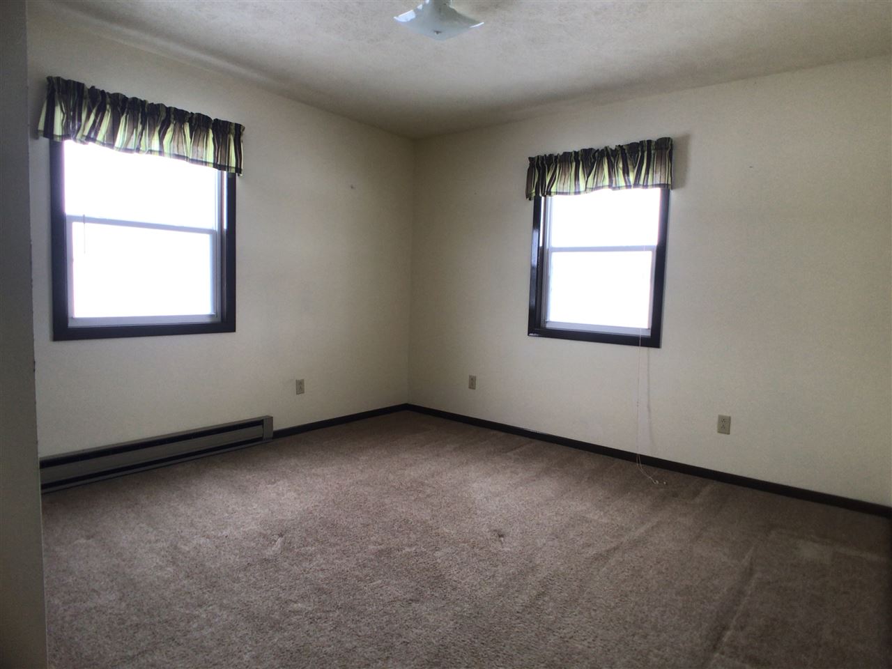 16253 Best Road Davis, IL 61019 - Photo 11 of 25 an empty room with a window