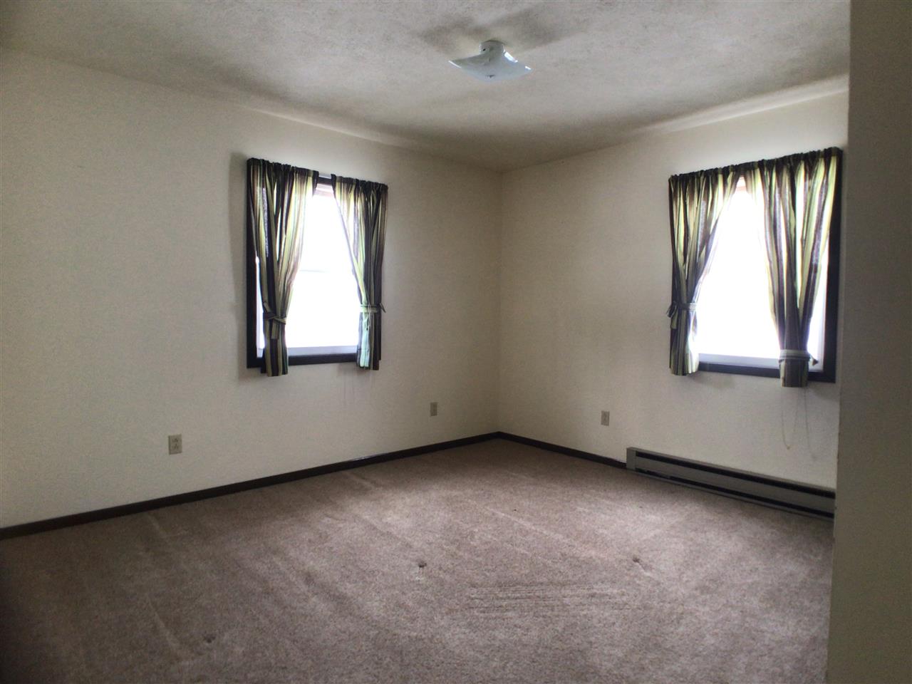 16253 Best Road Davis, IL 61019 - Photo 12 of 25 an empty room with windows