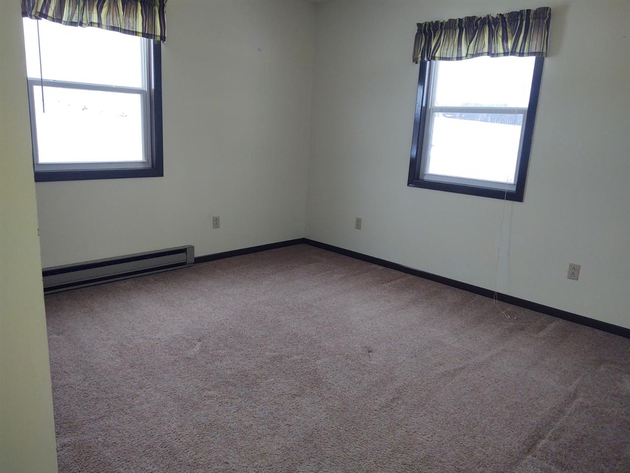 16253 Best Road Davis, IL 61019 - Photo 13 of 25 an empty room with a window