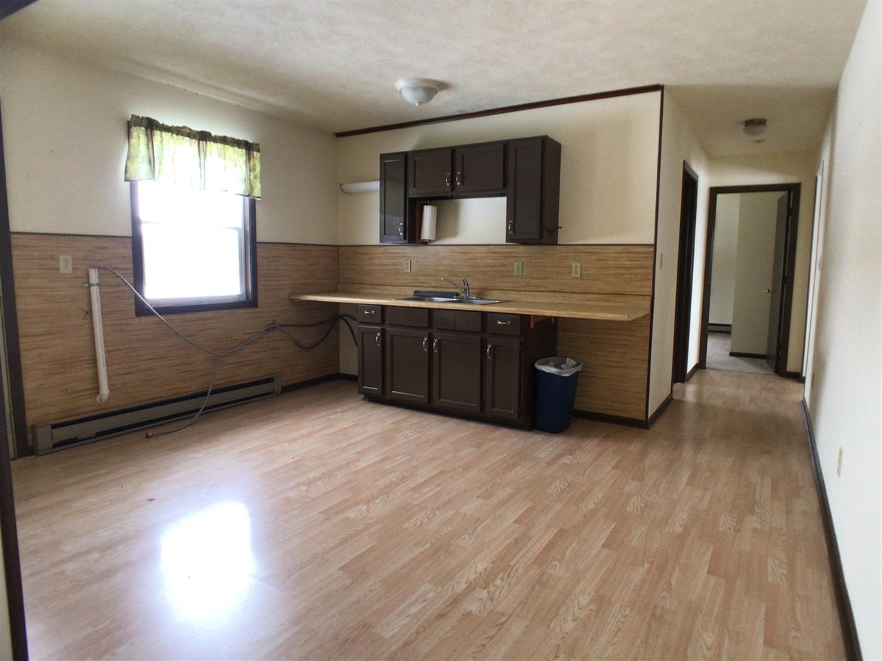 16253 Best Road Davis, IL 61019 - Photo 5 of 25 a kitchen with stainless steel appliances granite countertop a stove a sink and a microwave oven