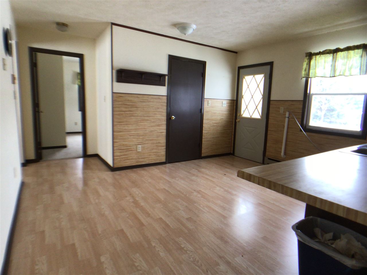 16253 Best Road Davis, IL 61019 - Photo 6 of 25 an empty room with wooden floor and windows