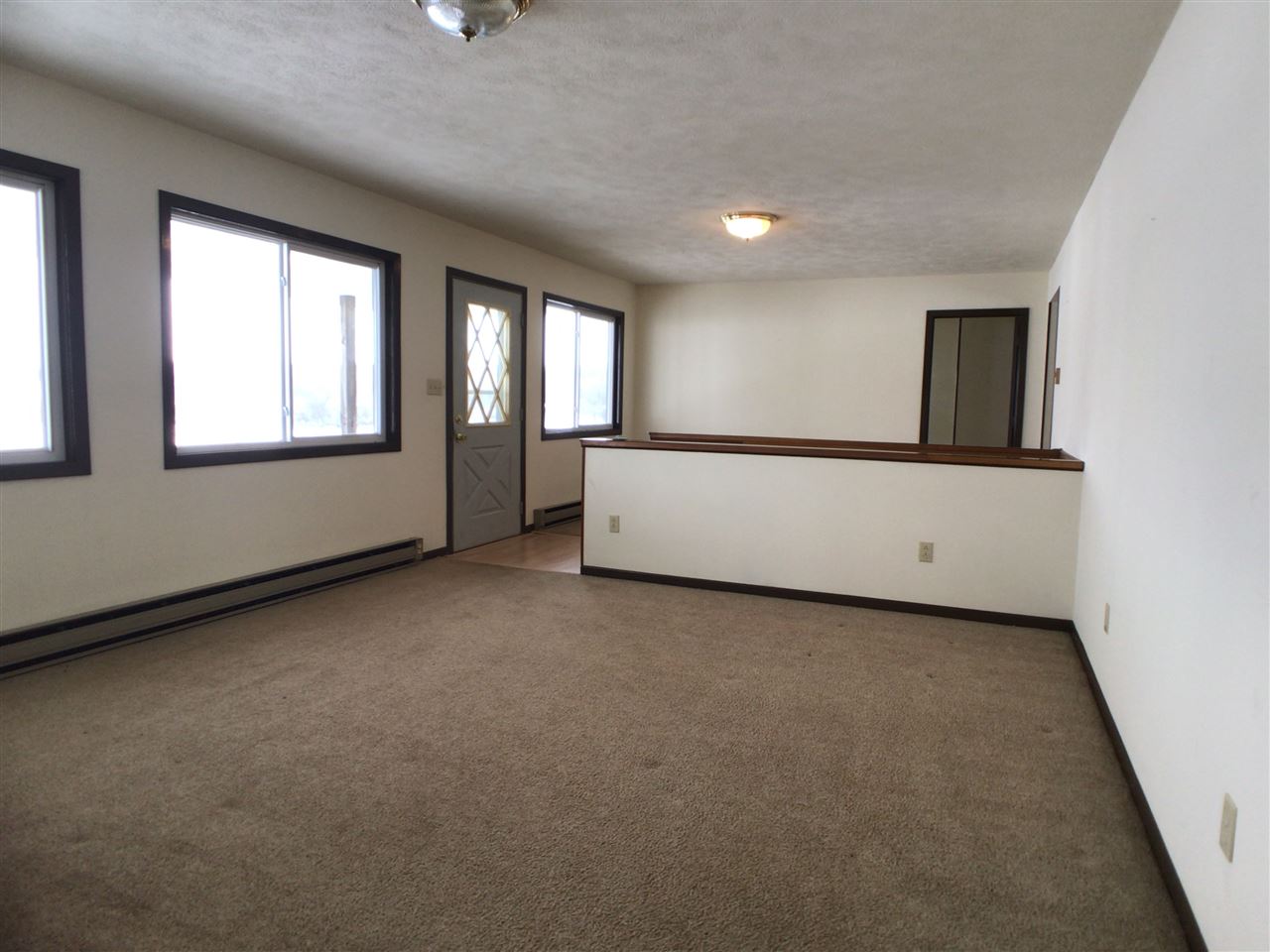 16253 Best Road Davis, IL 61019 - Photo 7 of 25 an empty room with windows