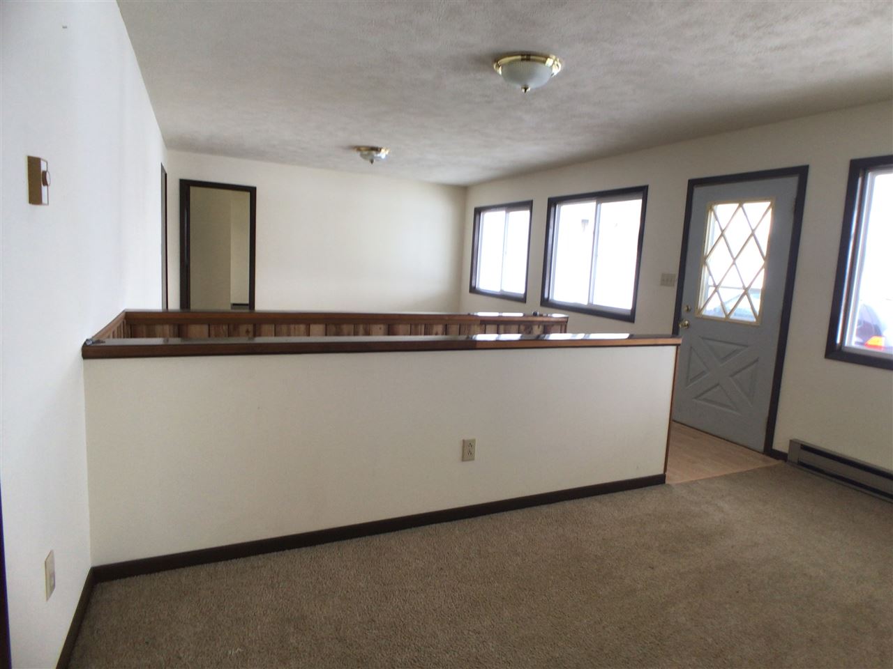 16253 Best Road Davis, IL 61019 - Photo 8 of 25 a room with wooden floor and window
