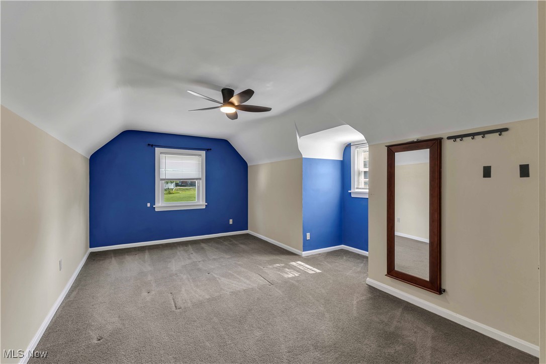 15388 Ridge Road North Royalton, OH 44133 - Photo 13 of 45 Additional living space featuring carpet, ceiling fan, and lofted ceiling