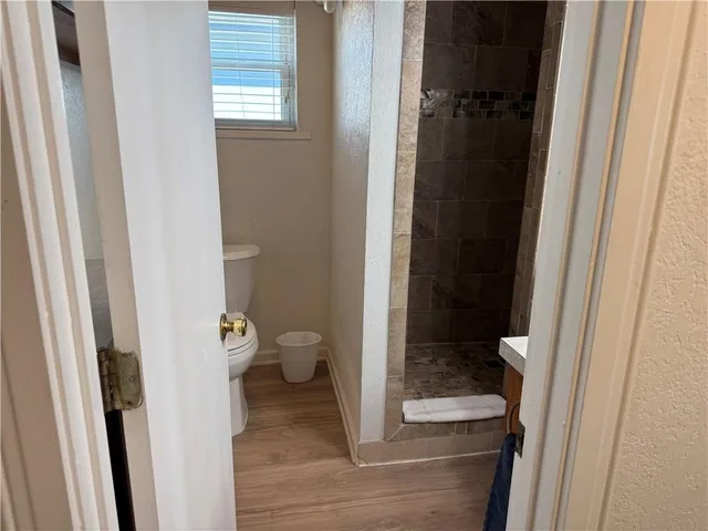 a bathroom with a sink and a toilet
