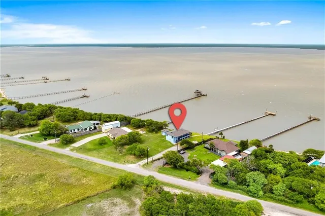 a view of a swimming pool and an ocean view