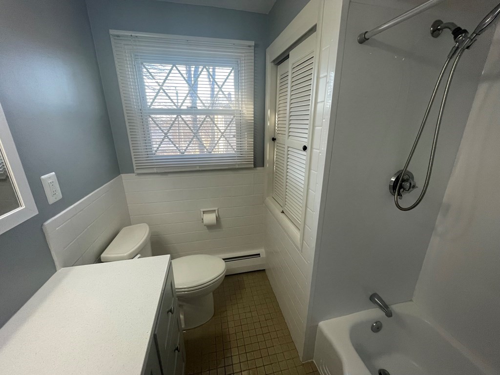 40 Dillon Street Worcester, MA 01604 - Photo 18 of 23 a bathroom with a sink and a toilet