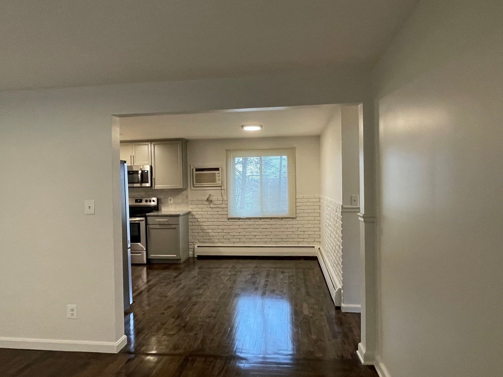 40 Dillon Street Worcester, MA 01604 - Photo 9 of 23 a view of kitchen and wooden floor