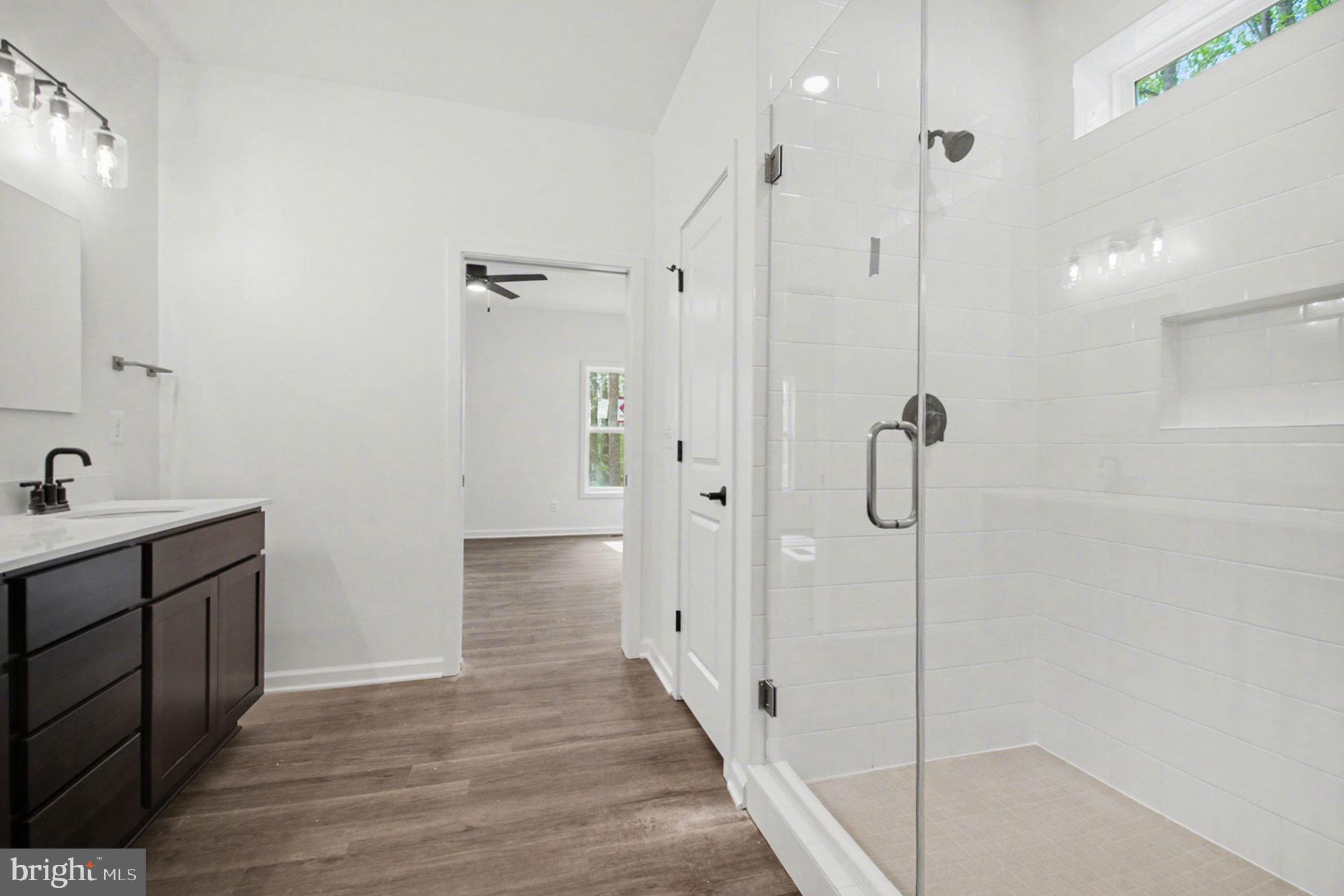 7253 Blackwell Road Warrenton, VA 20187 - Photo 29 of 41 Sleek modern bathroom oasis.