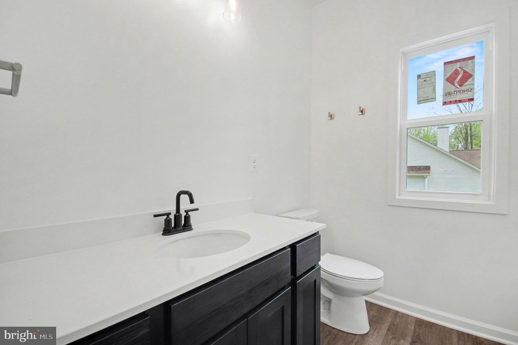 7253 Blackwell Road Warrenton, VA 20187 - Photo 32 of 41 Modern bathroom with sleek finishes.